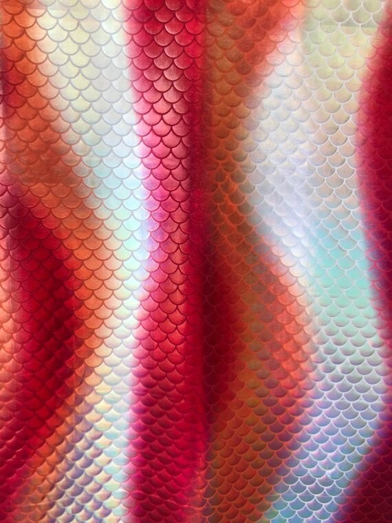 Beautiful Mermaid design red/multicolor all over foil nylon spandex 4-way stretch 58/60" Sold by the YD. Ships Worldwide from Los Angeles CA