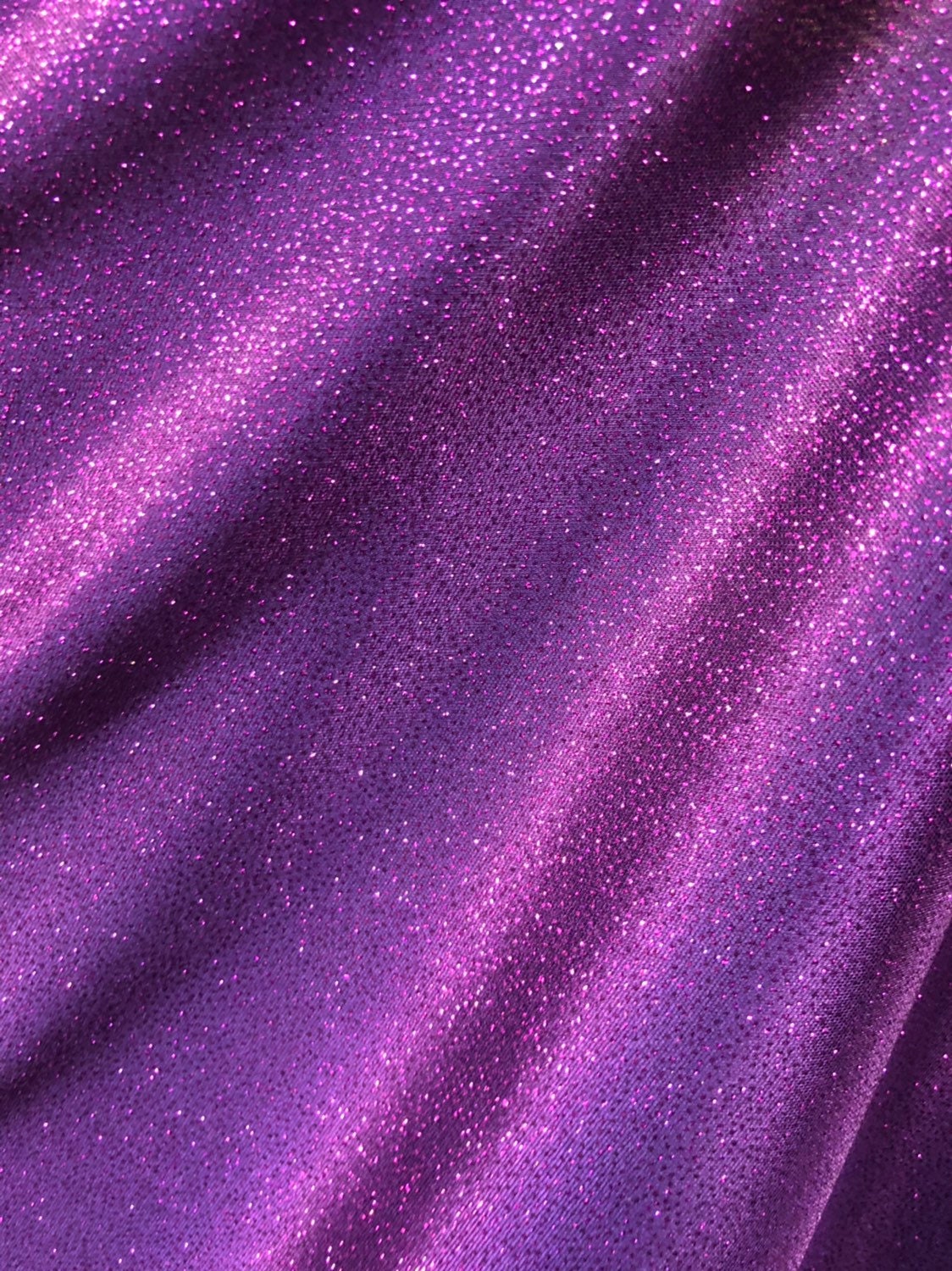 New spandex fabric with glitter all over Selena design 2way stretch 58/60" Sold by the YD. Ships worldwide from Los Angeles California USA