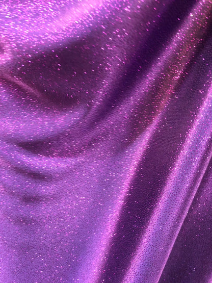 New Selana design poly spandex with glitter eggplant/purple 4way stretch 58/60" Sold by the YD. Ships worldwide from Los Angeles CA USA.