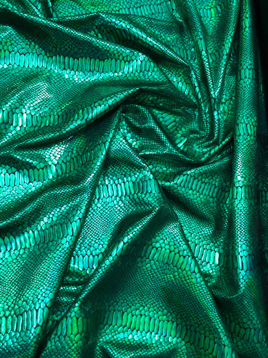 Snake design iridescent green metallic nylon spandex 4way stretch 58/60" Sold by the YD. Ships worldwide from Los Angeles California USA.