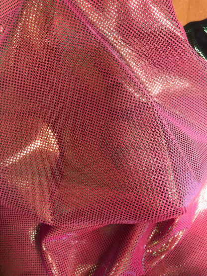 Power mesh with iridescent 2tone foil dots 4way stretch 58/60" Sold by the YD. Ships worldwide from Los Angeles California USA.