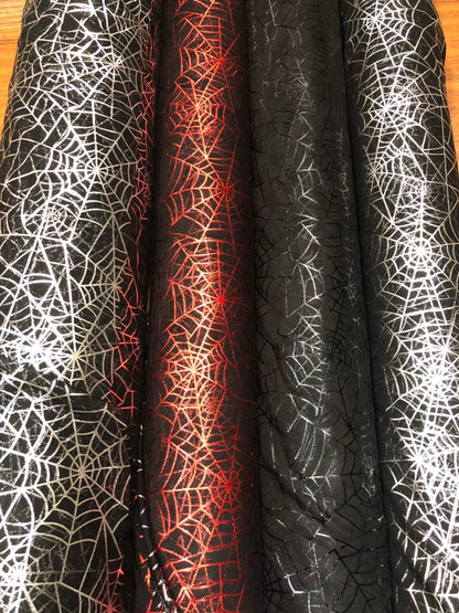 Spider web design with metallic foil on poly mesh 2way stretch 58/60" Sold by the YD. Ships worldwide from Los Angeles California USA.