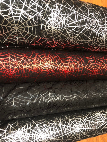 Spider web design with metallic foil on poly mesh 2way stretch 58/60" Sold by the YD. Ships worldwide from Los Angeles California USA.