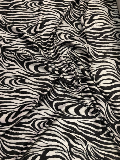 Zebra design  with silver glitter on heavy stretch velvet 4way 58/60" Sold by the YD. Ships worldwide from Los Angeles California USA.