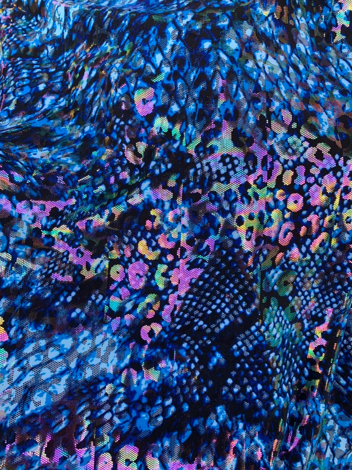 Animal print iridescent snake hologram foil metallic 4way stretch 58/60" Sold by the YD. Ships worldwide from Los Angeles California USA.