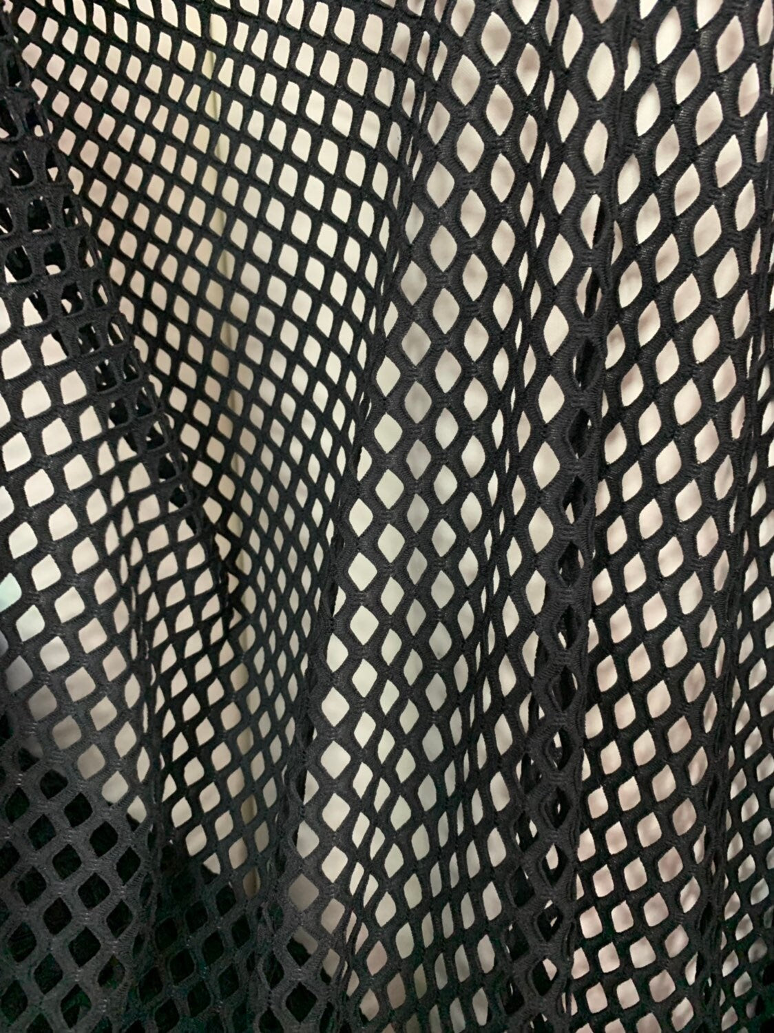 Fishnet fabric big size nylon spandex 4way stretch 58/60" Sold by the YD. Ships worldwide from Los Angeles California USA.