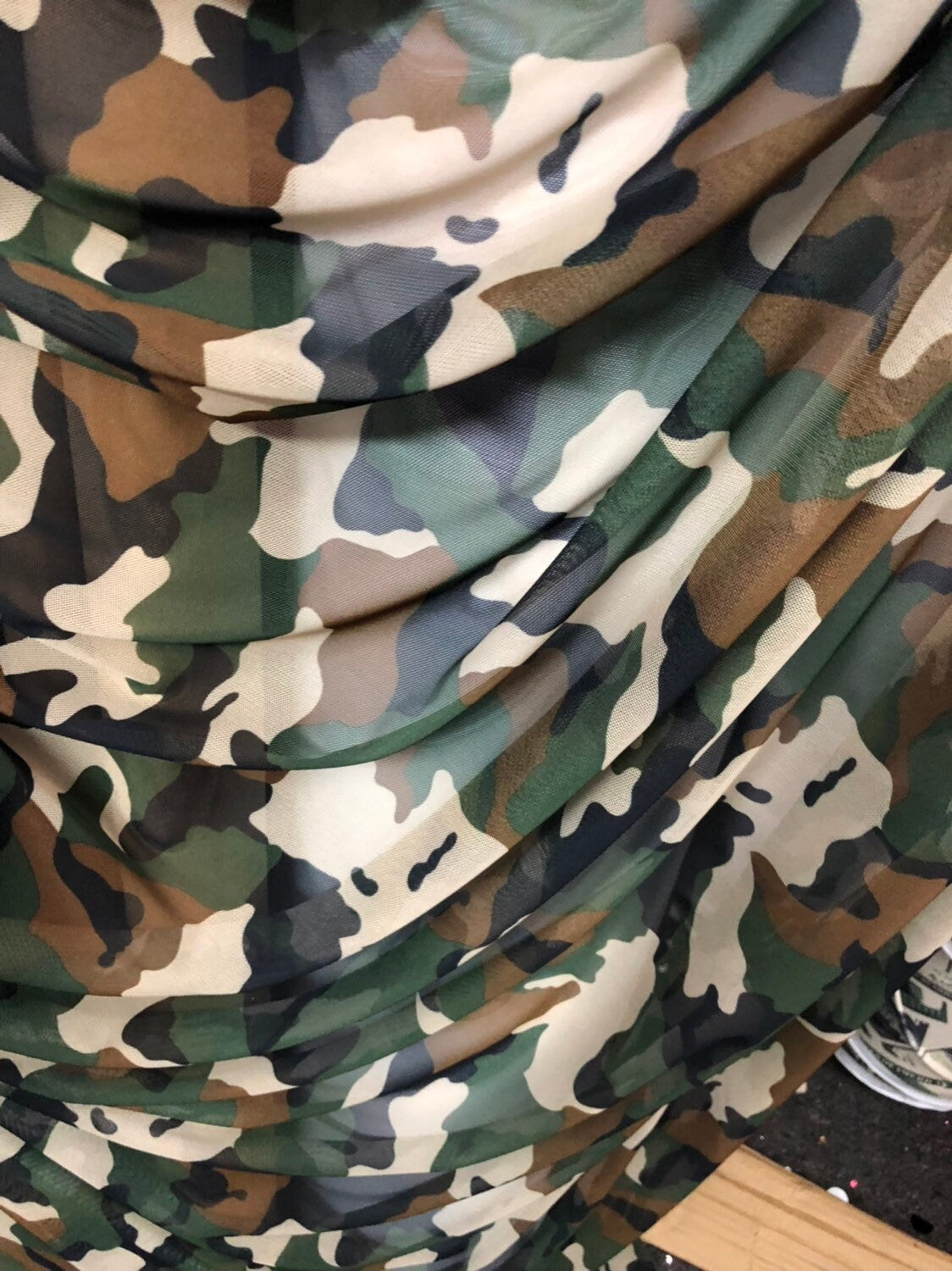 Camouflage design on power mesh 4way stretch 58/60" Sold by the YD. Ships worldwide from Los Angeles California USA.