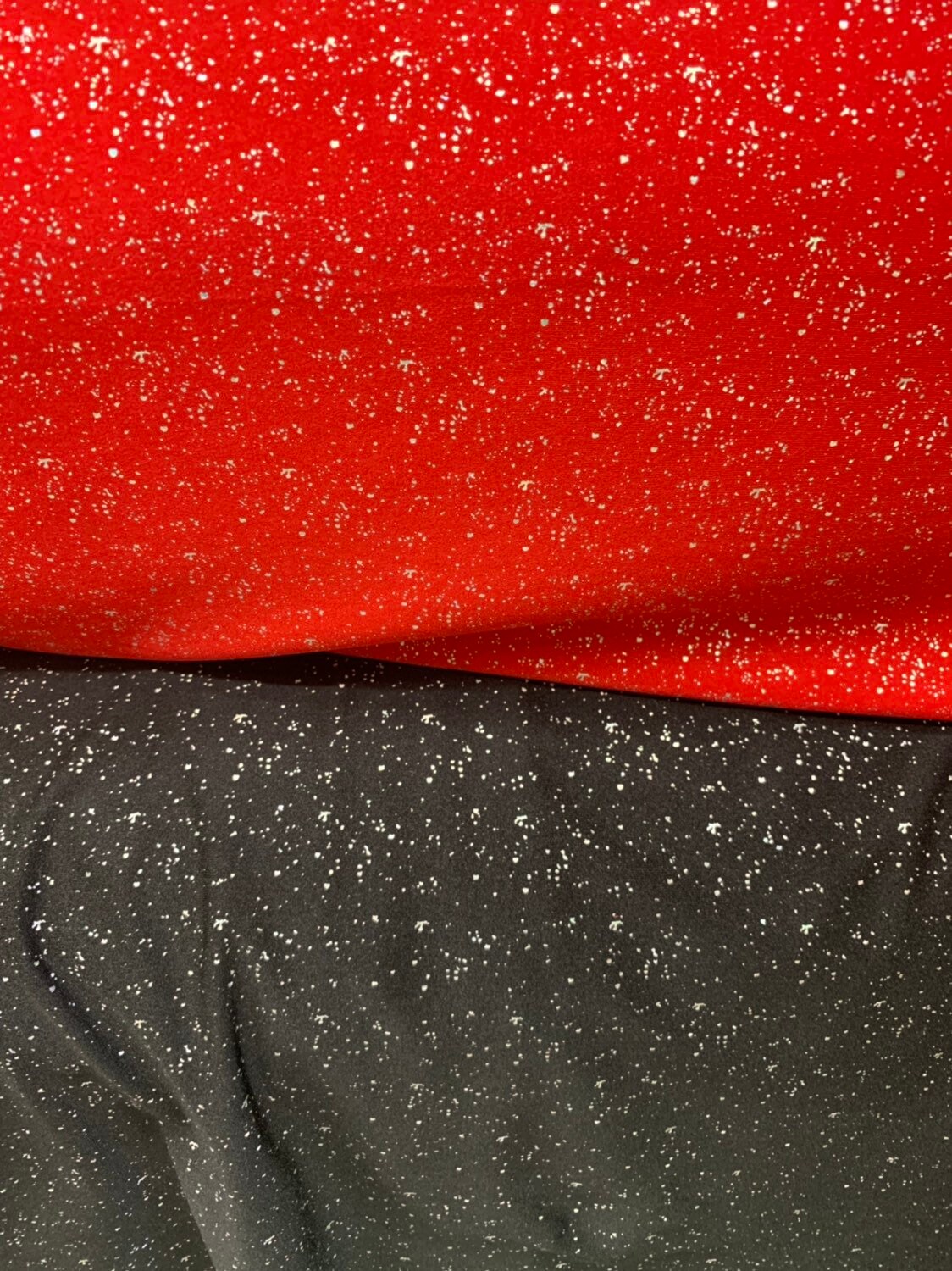 Metallic sparkles nylon spandex black & red 4way stretch 58/60" Sold by the YD. Ships worldwide from Los Angeles California USA