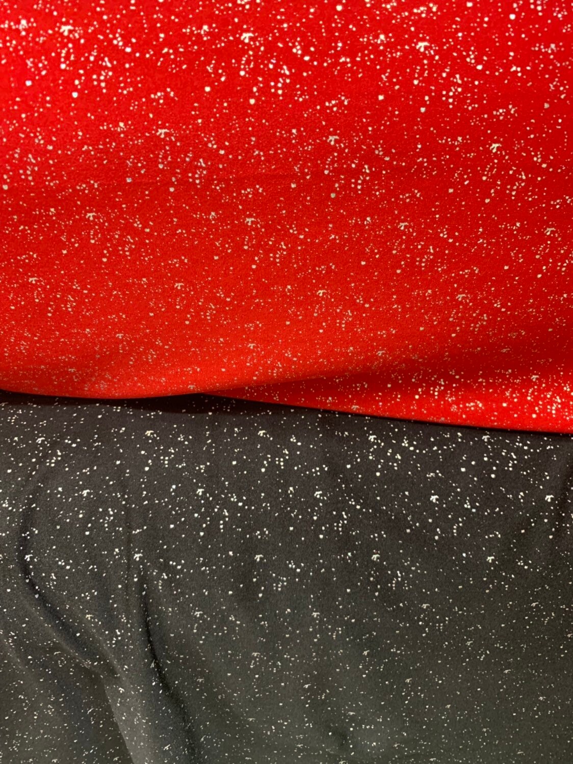 Metallic sparkles nylon spandex black & red 4way stretch 58/60" Sold by the YD. Ships worldwide from Los Angeles California USA