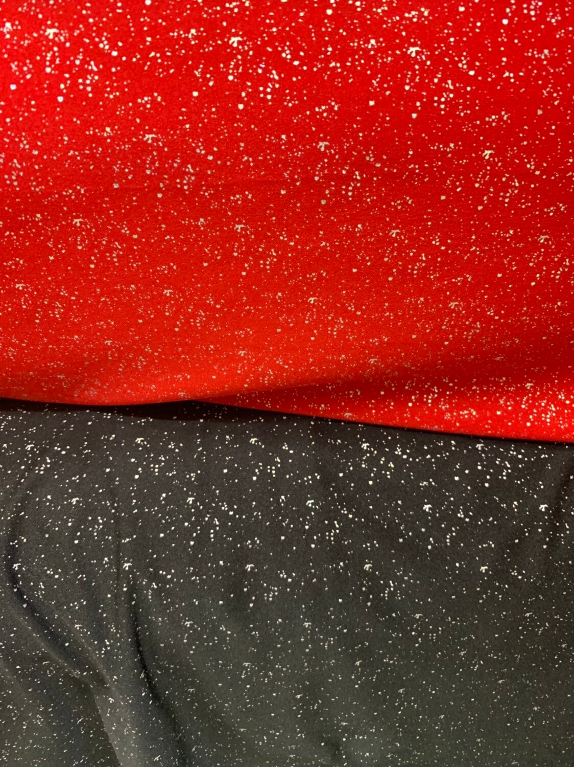 Metallic sparkles nylon spandex black & red 4way stretch 58/60" Sold by the YD. Ships worldwide from Los Angeles California USA