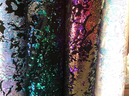 New Iridescent patch sequins on heavy stretch velvet 4way 2tone sequins 58/60" Sold by the YD. Ships worldwide from Los Angeles California.