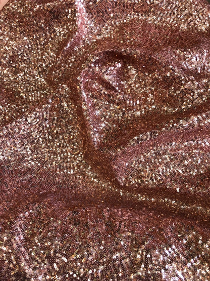 Rose gold mini glitz sequins on heavy spandex 4way stretch 58/60" Sold by the YD. Ships worldwide from Los Angeles California USA.