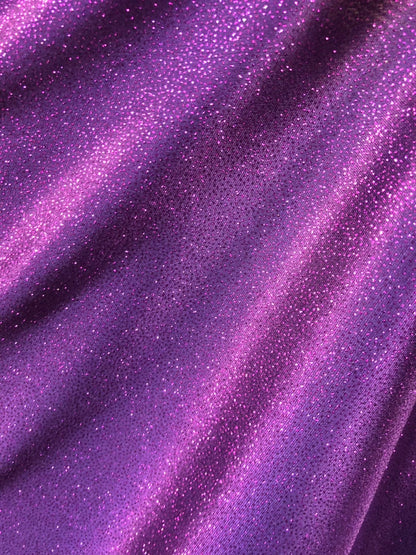 New Selana design poly spandex with glitter eggplant/purple 4way stretch 58/60" Sold by the YD. Ships worldwide from Los Angeles CA USA.