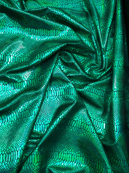 Snake design iridescent green metallic nylon spandex 4way stretch 58/60" Sold by the YD. Ships worldwide from Los Angeles California USA.