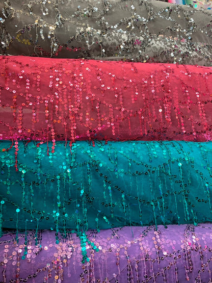 Hanging sequins all over on stretch mesh 2way 55/57" Sold by the YD. Ships worldwide from Los Angeles California USA.