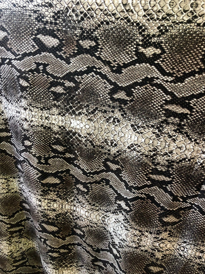 Snake design spandex fabric 2way stretch 58/60" Sold by the YD. Ships worldwide from Los Angeles California USA.