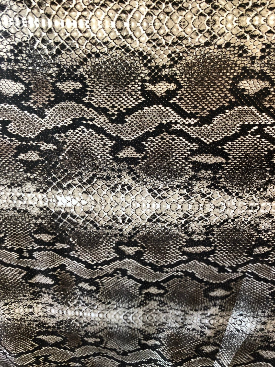 Snake design spandex fabric 2way stretch 58/60" Sold by the YD. Ships worldwide from Los Angeles California USA.