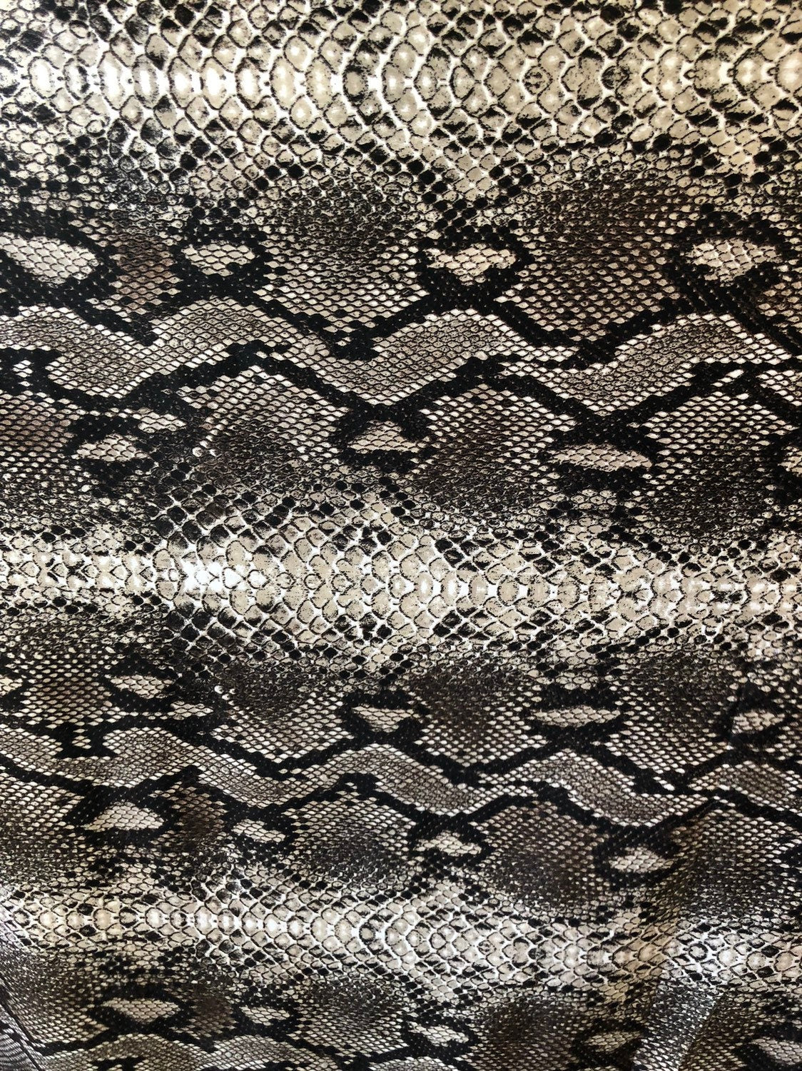 Snake design spandex fabric 2way stretch 58/60" Sold by the YD. Ships worldwide from Los Angeles California USA.