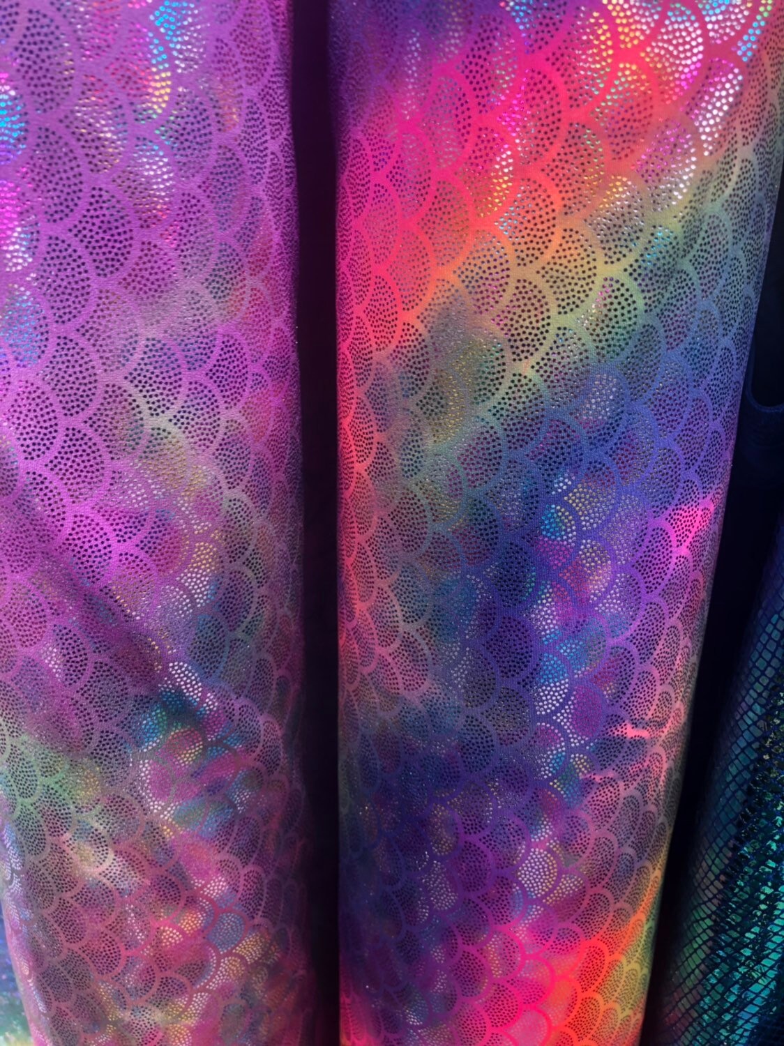 Mermaid design tie dye multicolor hologram metallic nylon spandex 4way stretch 58/60" Sold by the YD. Ships worldwide from Los Angeles CA.