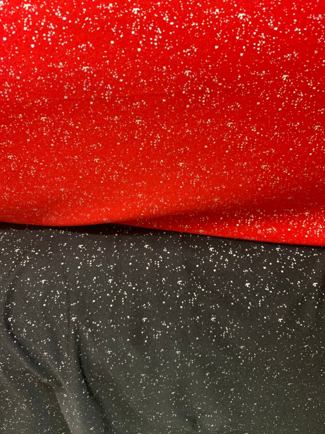 Metallic sparkles nylon spandex black & red 4way stretch 58/60" Sold by the YD. Ships worldwide from Los Angeles California USA