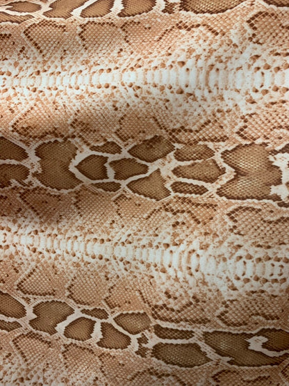 Snake design natural color nylon spandex 4way stretch 58/60" Sold by the YD. Ships worldwide from Los Angeles California.