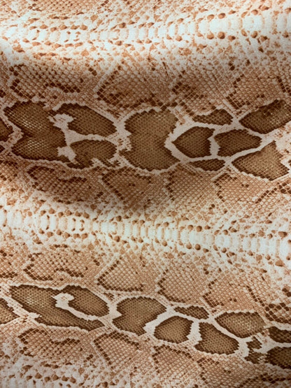 Snake design natural color nylon spandex 4way stretch 58/60" Sold by the YD. Ships worldwide from Los Angeles California.