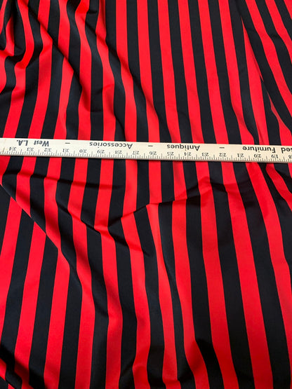 Stripe matte red/black nylon spandex 4way stretch 58/60" Sold by the YD. Ships worldwide from Los Angeles California USA.