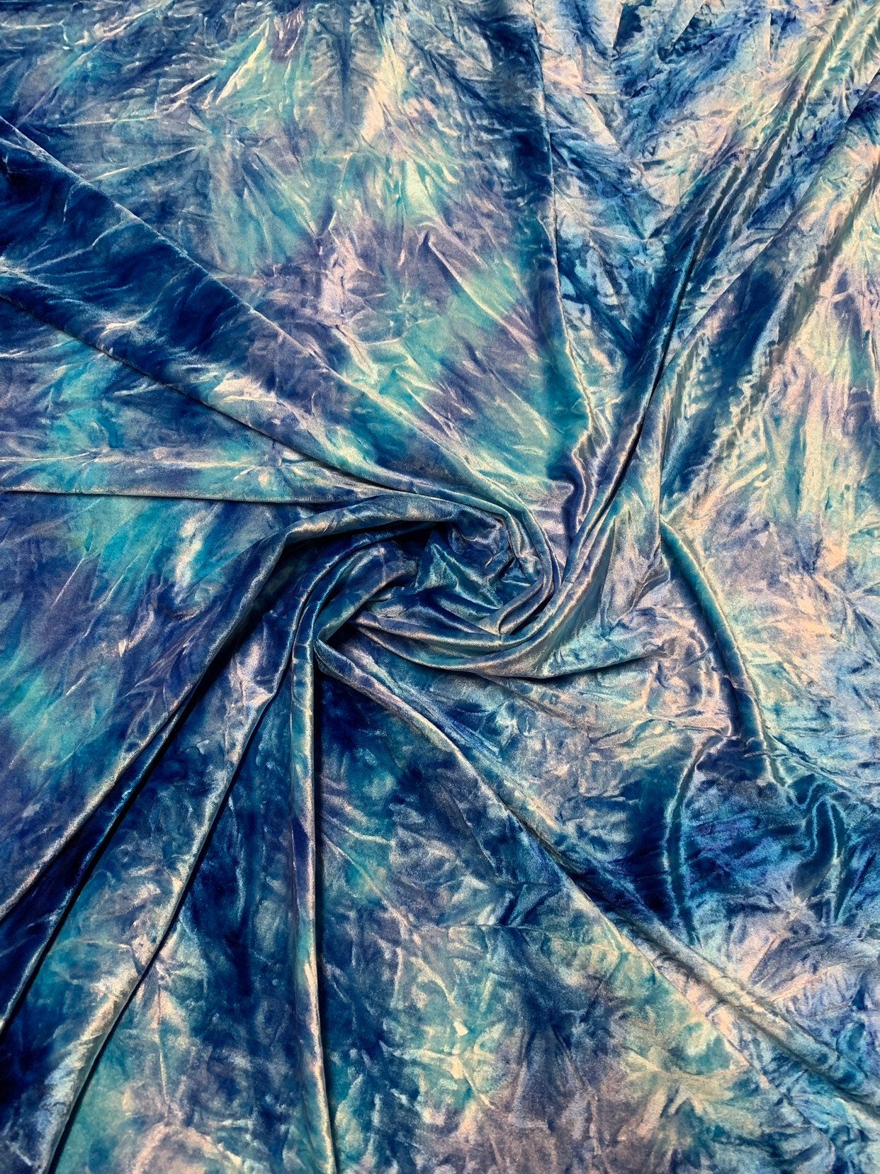 New heavy Stretch velvet tie dye print Poly Spandex 58/60" Sold by the YD. Ships worldwide from Los Angeles California USA.