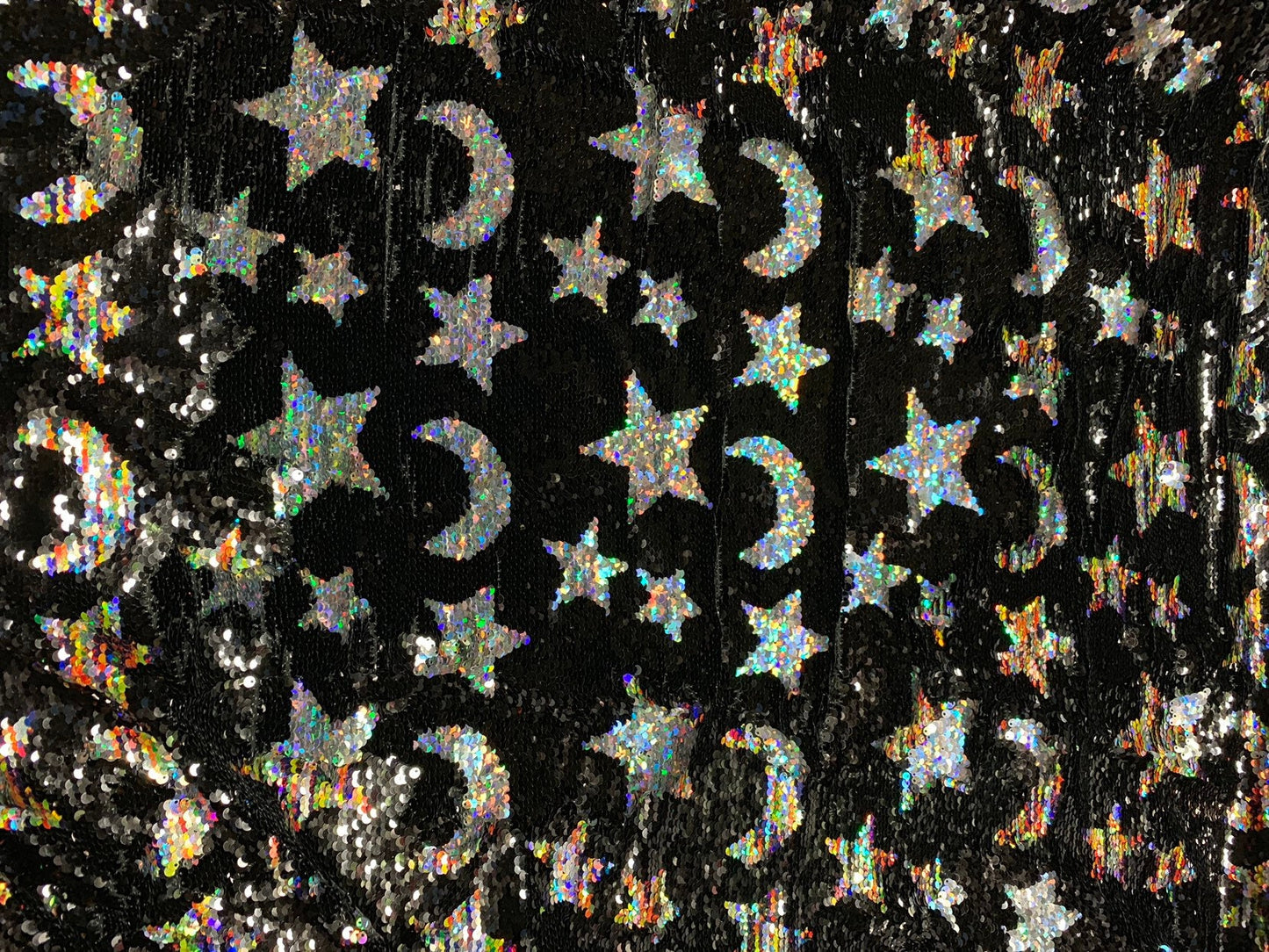 New reversible flip up sequins moon and stars design multicolor sequins on stretch base 2way stretch 58/60" Sold by the YD. Ships worldwide.