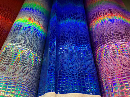 New iridescent crocodile design heavy vinyl with foil 58/60" non stretch sold by the YD. Ships worldwide from Los Angeles California USA.