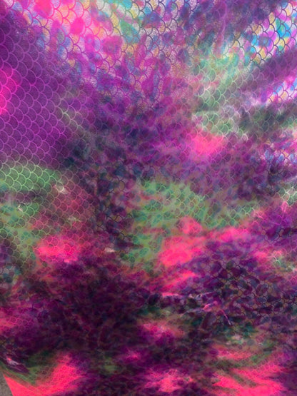 Mermaid design tie dye multicolor hologram metallic nylon spandex 4way stretch 58/60" Sold by the YD. Ships worldwide from Los Angeles CA.