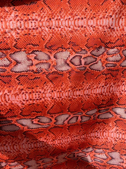 New snake design print on heavy nylon spandex 4way stretch 58/60" Sold by the YD. Ships worldwide from Los Angeles California USA.