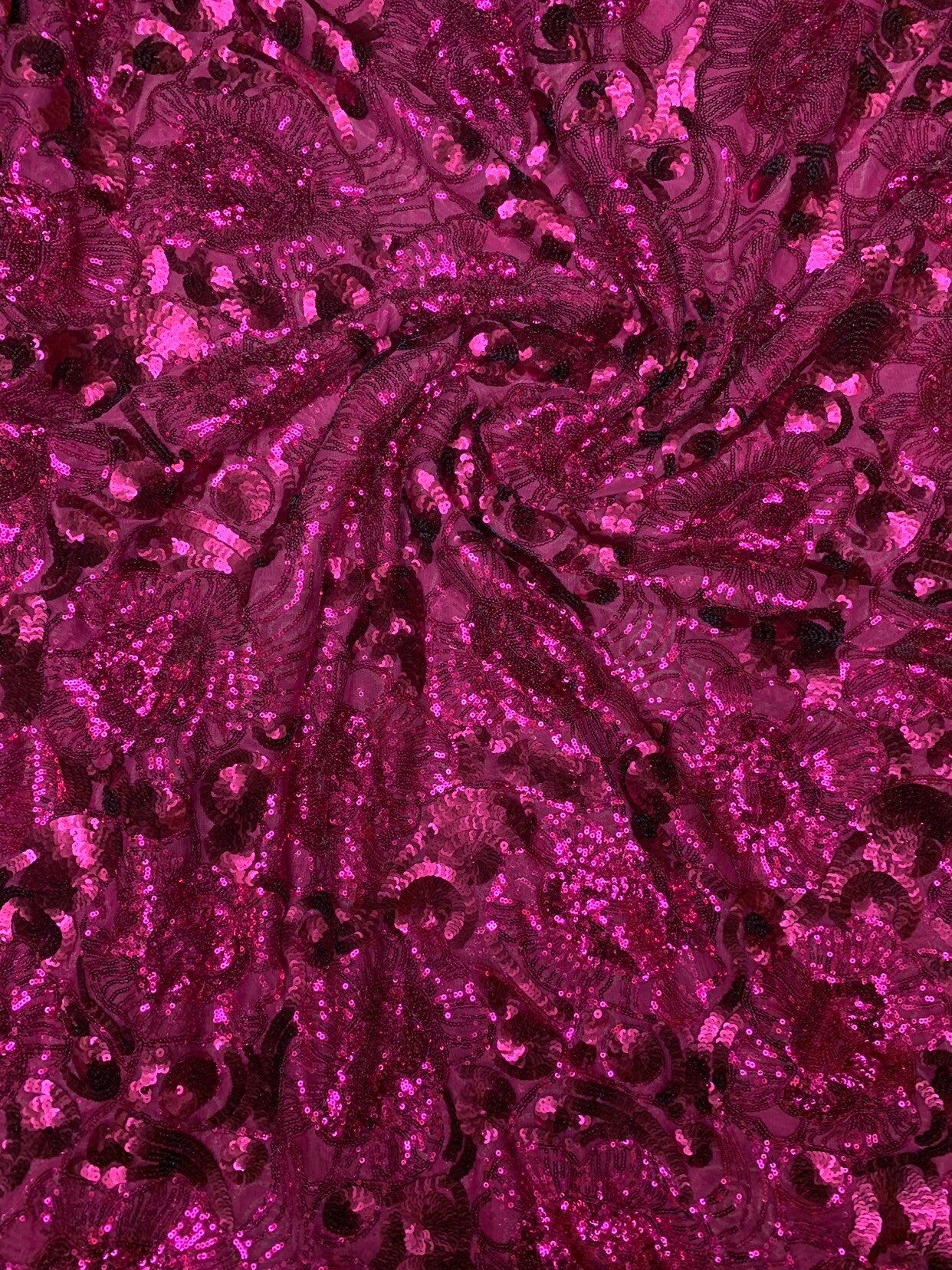 New flower design magenta color multi sequins on stretch mesh 2way 55/57" Sold by the YD. Ships worldwide from Los Angeles California USA.