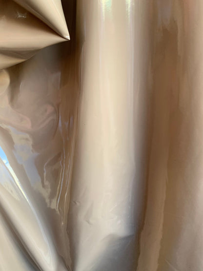 Shiny taupe Latex nylon spandex 4way stretch 58/60" Sold by the YD. Ships worldwide from Los Angeles California USA.