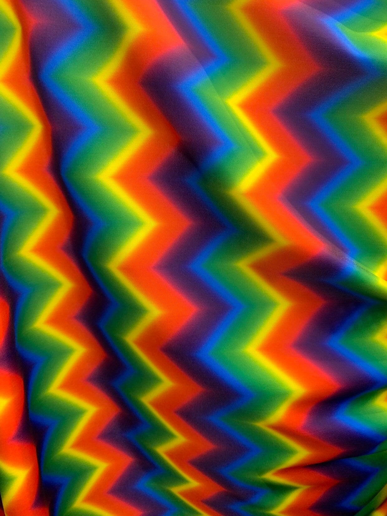 New rainbow chevron print on nylon spandex 4way Stretch 58/60" Sold by the YD. Ships worldwide from Los Ángeles California USA.