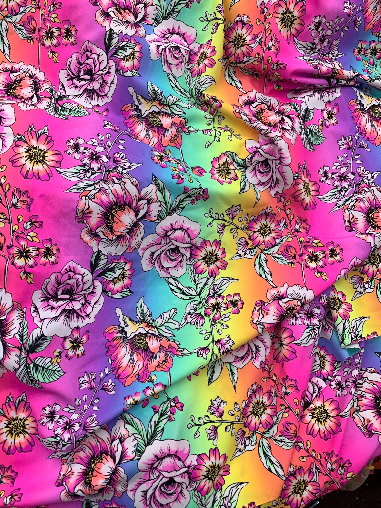 New flower design multicolor print on heavy nylon spandex 4way stretch 58/60" Sold by the  YD. Ships worldwide from Los Angeles California.