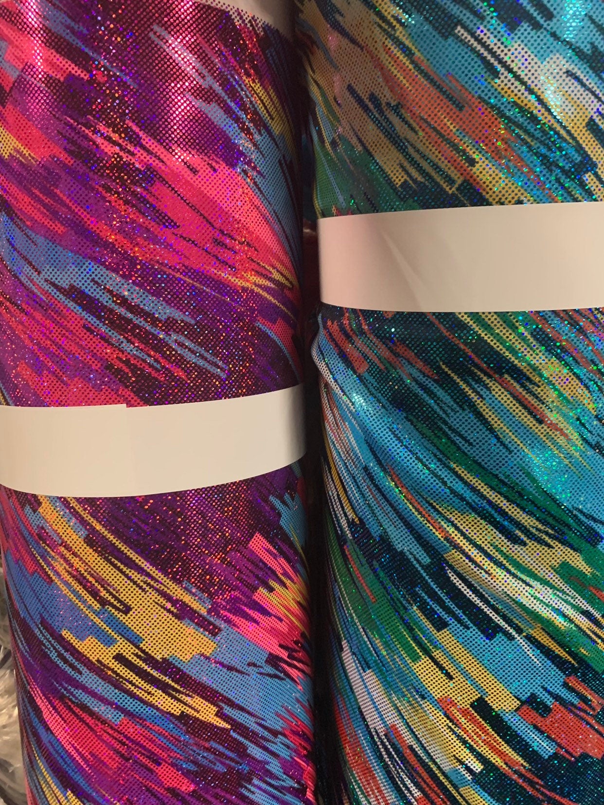 Swing swing design hologram metallic nylon spandex 4way stretch 58/60" Sold by the YD. Ships worldwide from Los Angeles California USA.