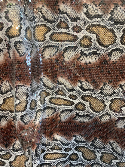 Snake design brown/gold with clear sequins all over spandex base 2way 58/60" Sold by the YD. Ships worldwide from Los Ángeles California USA