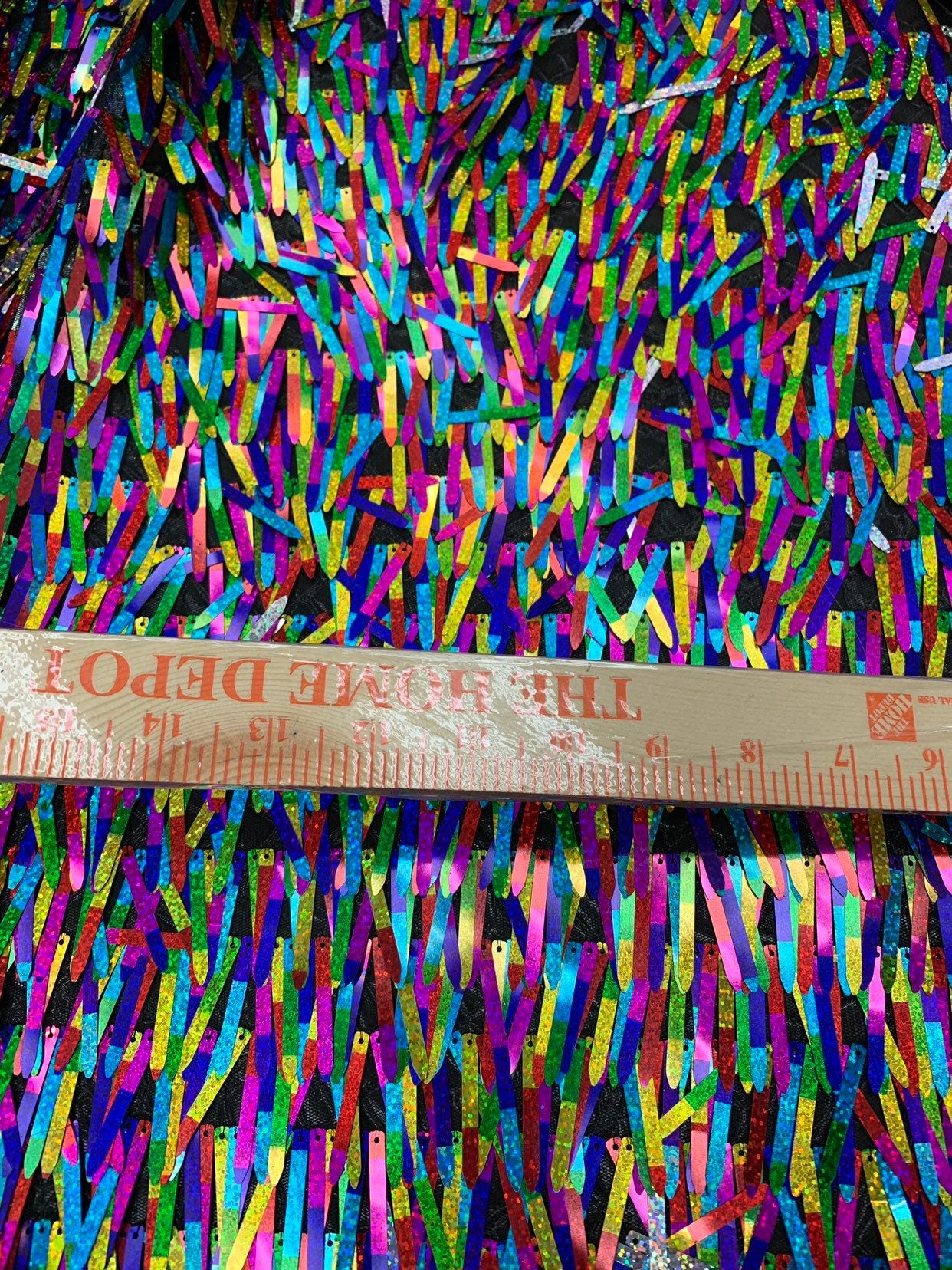 New fringe design iridescent multicolor sequins on stretch mesh base 2way stretch 58/60" Sold by the YD. Ships worldwide from Los Angeles CA