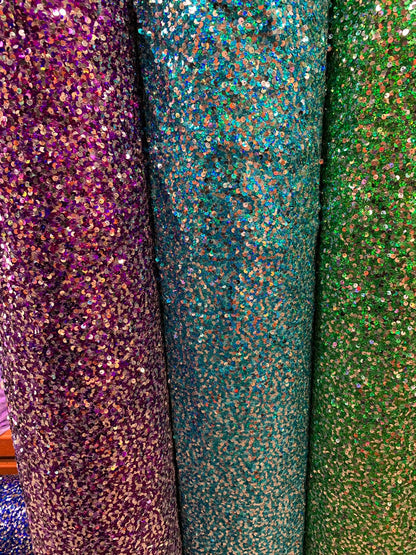 New hologram iridescent sequins rain drop sequins on stretch mesh 4way 55/57" Sold by the YD. Ships worldwide from Los Angeles California US