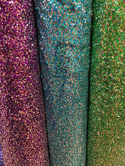 New hologram iridescent sequins rain drop sequins on stretch mesh 4way 55/57" Sold by the YD. Ships worldwide from Los Angeles California US