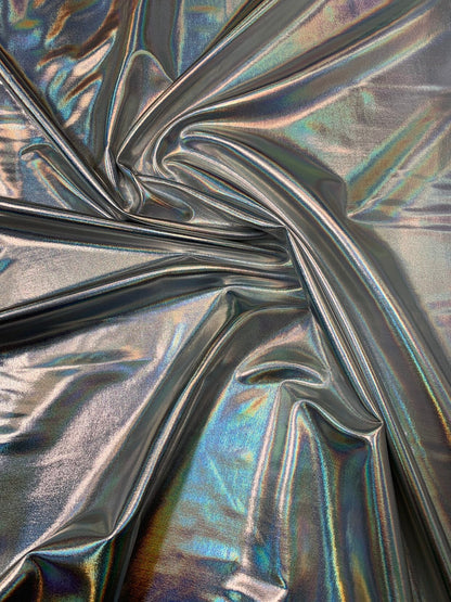 Iridescent silver all over foil metallic haevy nylon spandex 4way stretch 58/60" Sold bybthe YD. Ships worldwide from Los Angeles California