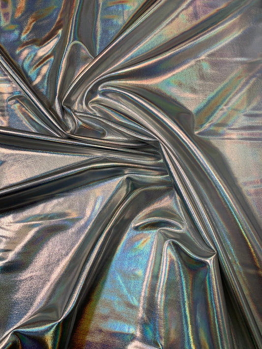 Iridescent silver all over foil metallic haevy nylon spandex 4way stretch 58/60" Sold bybthe YD. Ships worldwide from Los Angeles California