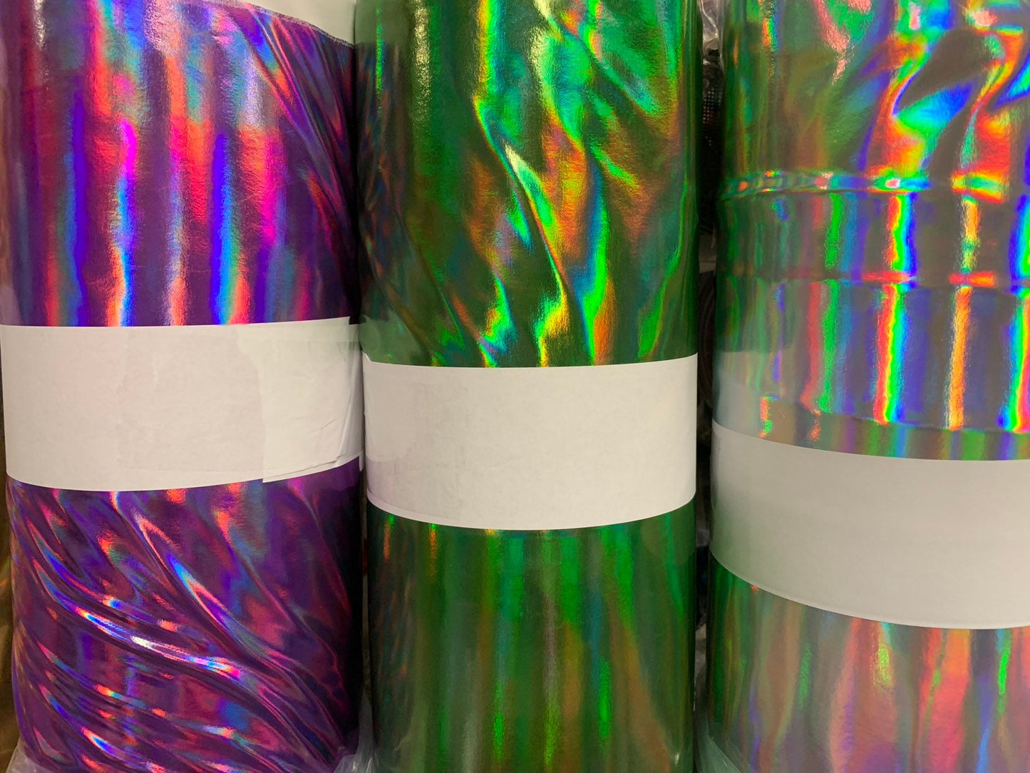 New iridescent heavy mirror vinyl 4way stretch 58/60" Sold by the YD. Ships worldwide from Los Angeles California USA.