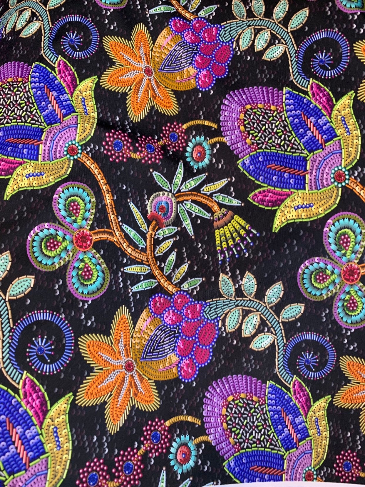 New print nylon spandex Angy flower design 4way stretch 58/60" Sold by the YD. Ships worldwide from Los Angeles California USA.