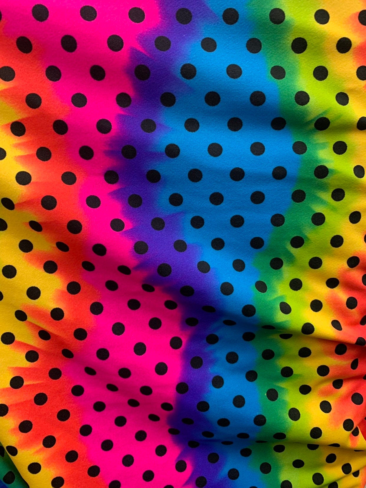 New rainbow polka dots design heavy nylon spandex 4way stretch 58/60" Sold by the YD. Ships worldwide from Los Ángeles California USA.