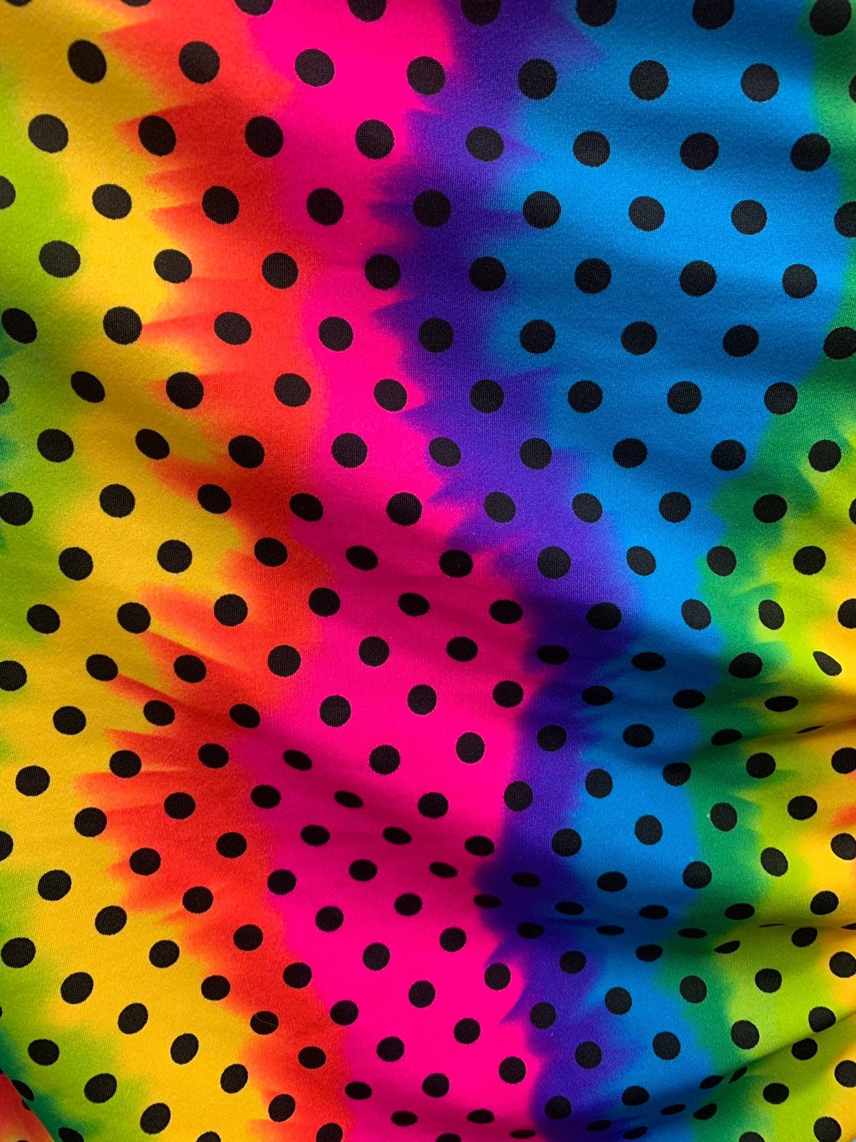 New rainbow polka dots design heavy nylon spandex 4way stretch 58/60" Sold by the YD. Ships worldwide from Los Ángeles California USA.