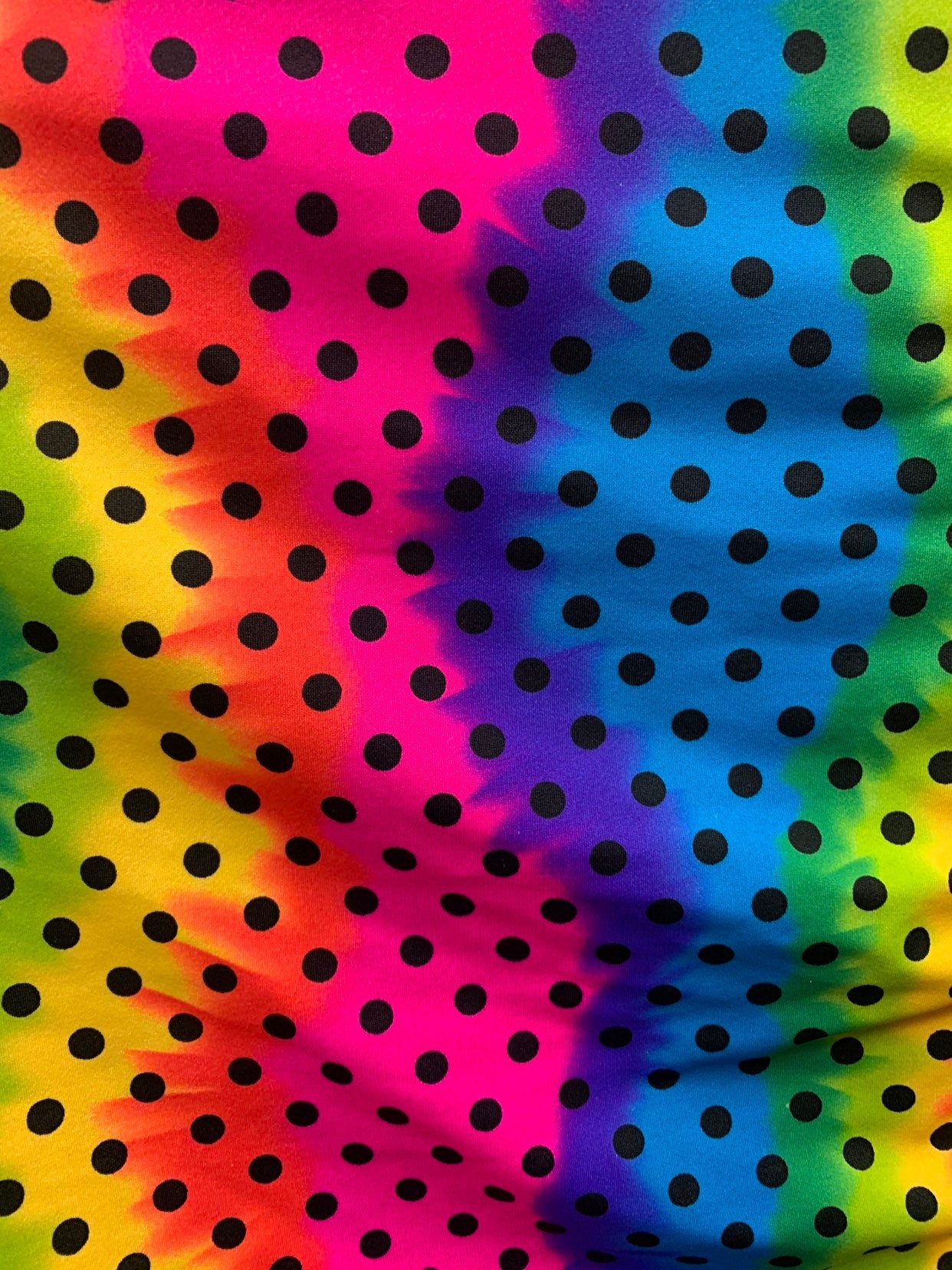 New rainbow polka dots design heavy nylon spandex 4way stretch 58/60" Sold by the YD. Ships worldwide from Los Ángeles California USA.