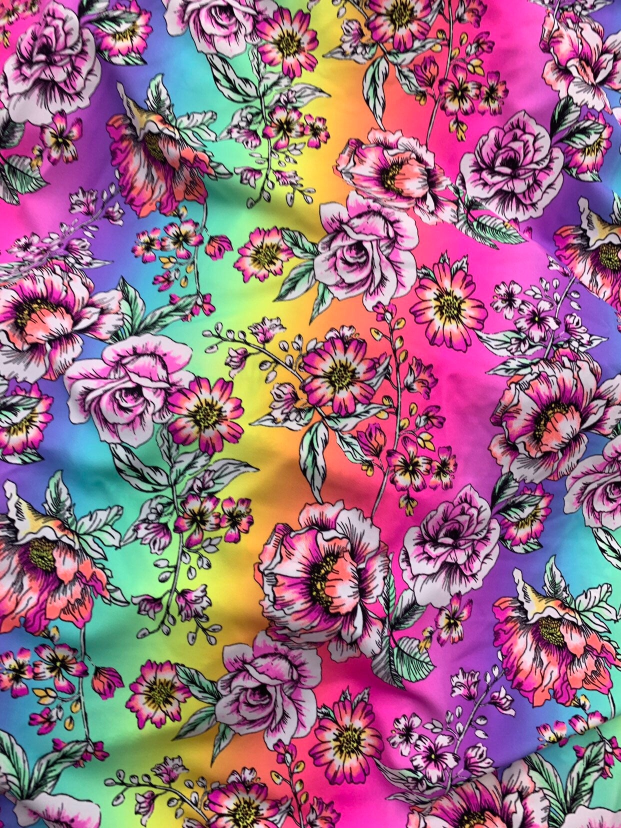 New flower design multicolor print on heavy nylon spandex 4way stretch 58/60" Sold by the  YD. Ships worldwide from Los Angeles California.