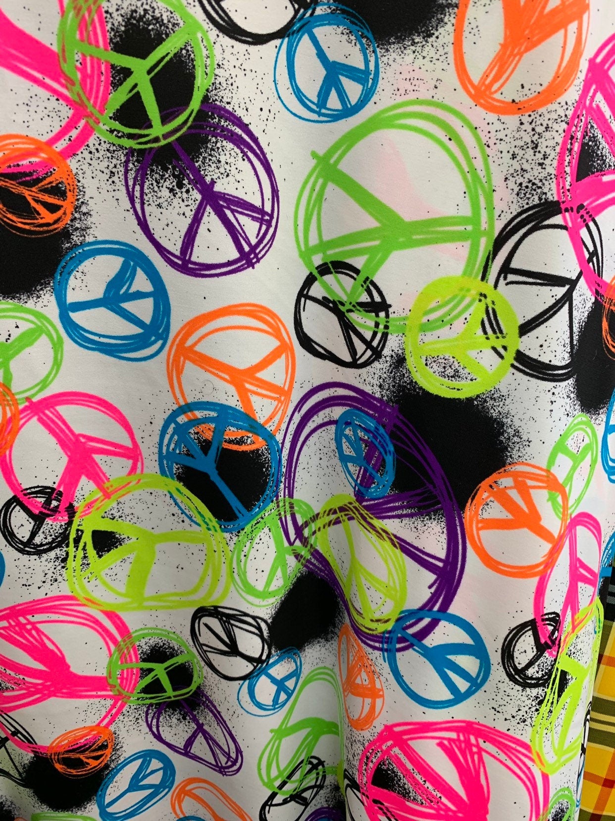 Peace and love design print on heavy nylon spandex 4way stretch 58/60" Sold by the YD. Ships worldwide from Los Angeles California USA.